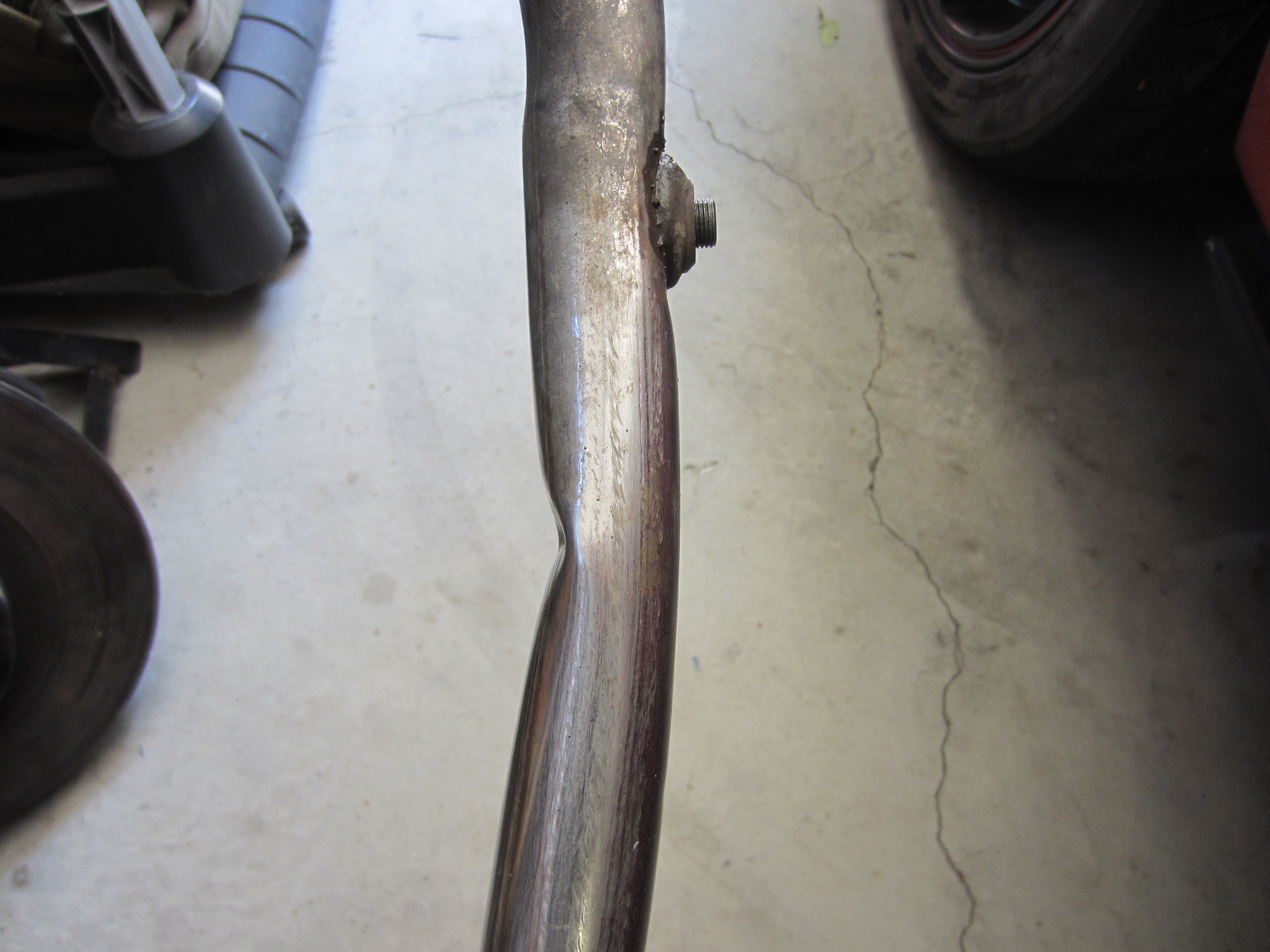 Damaged coolant pipe, viewed from the side