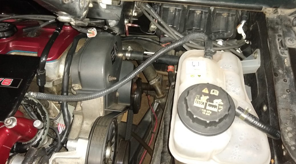 1988 Fiero with 3.4 V6 engine and coolant expansion tank
