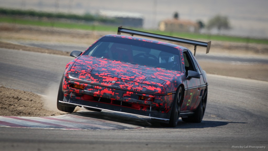 With the low-hanging aero bits, lowered suspension, and almost-slick tires, this configuration won't cut it in the gravel.